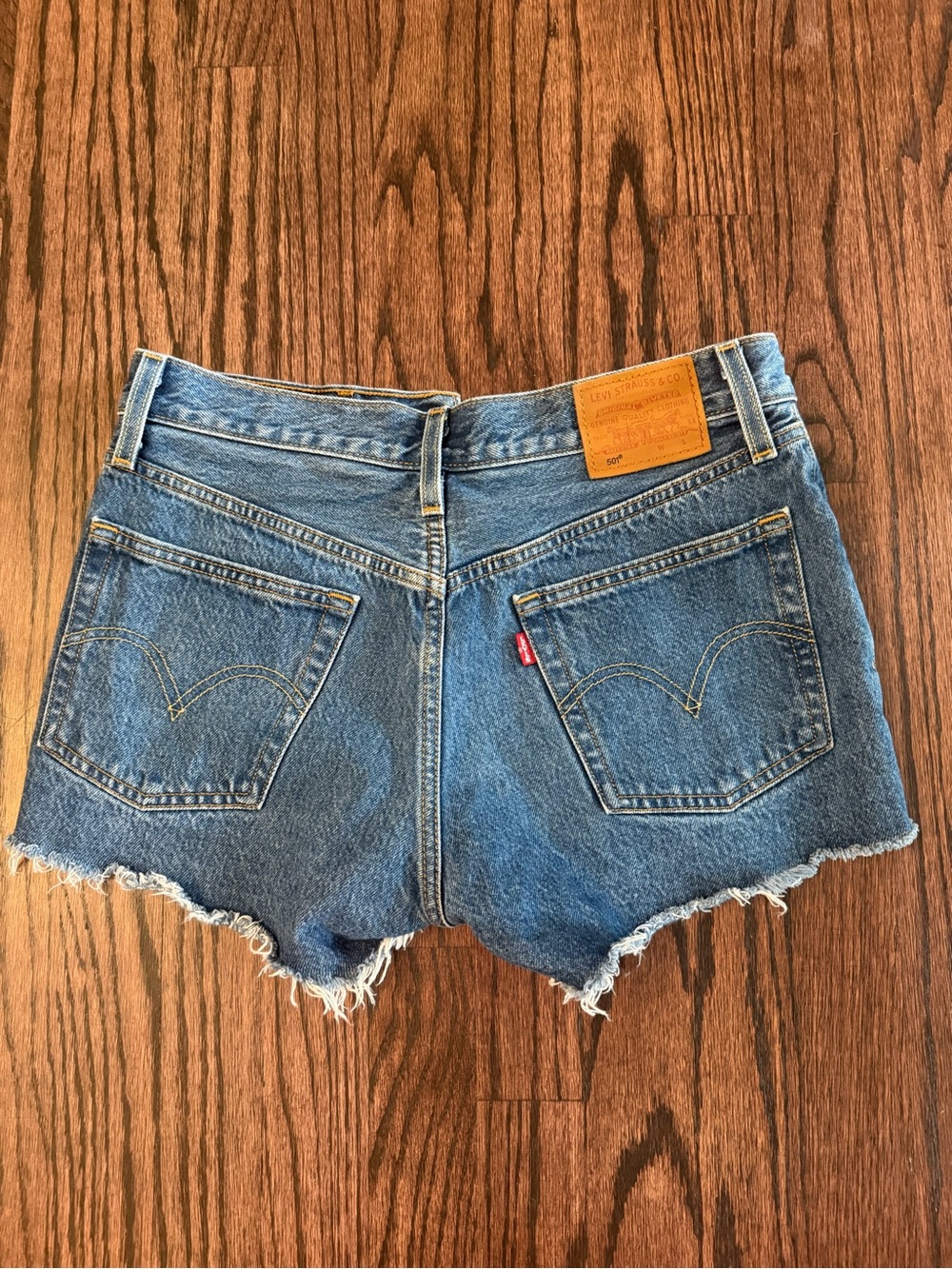 Levi's Medium Blue Denim Frayed Hem Cutoff Shorts